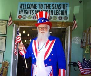 veterans honored annual service uncle sam seaside during greets resident emil portrays attendees held nov program park he