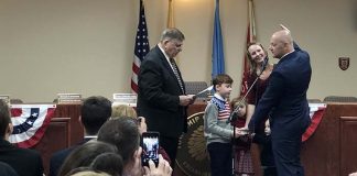 Local officials, friends and family attended the swearing-in ceremonies for the new governing body. (Photo by Kimberly Bosco)