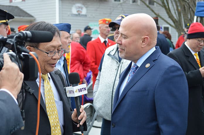 Congressman Tom MacArthur speaking with Vietnamese News Reporters from Washington D.C. during an event in Barnegat in 2018. (Photo by Bill Clanton, Jr.)