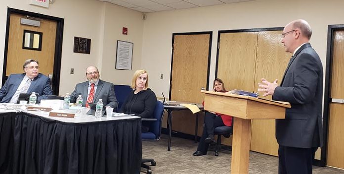 John Swisher of the auditing firm Suplee, Clooney and Company, Westfield, addresses the Jackson Board of Education about its finances and audit during a recent meeting of the school board. (Photo by Bob Vosseller)