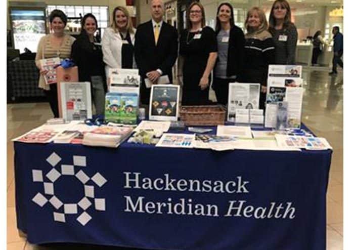 (Left to right): Tracy Nerney, Christine Frugard, Colleen Murphy, Dr. Bradley Pulver, Ryan Hill-Husosky, Melissa Kirchner, Patty Strassburg, and Kathy Feeney. Joanne Varner was not present for the photo. (Photo courtesy Ocean Medical Center)