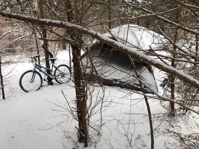 The few remaining homeless at the Route 9 site have had to brave a cold winter. (Photo by Cindy Lanouette)