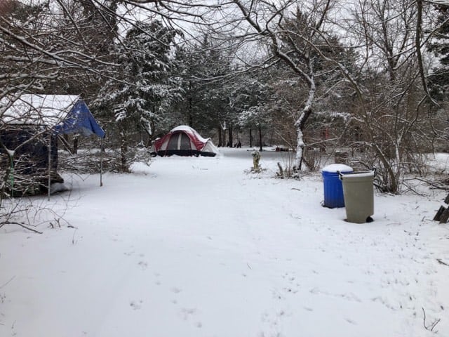 The few remaining homeless at the Route 9 site have had to brave a cold winter. (Photo by Cindy Lanouette)