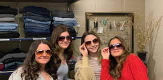 Students don sunglasses during a shopping spree at the McAuliffe Middle School Vintage Shop. (Photo courtesy Jackson Township School District)