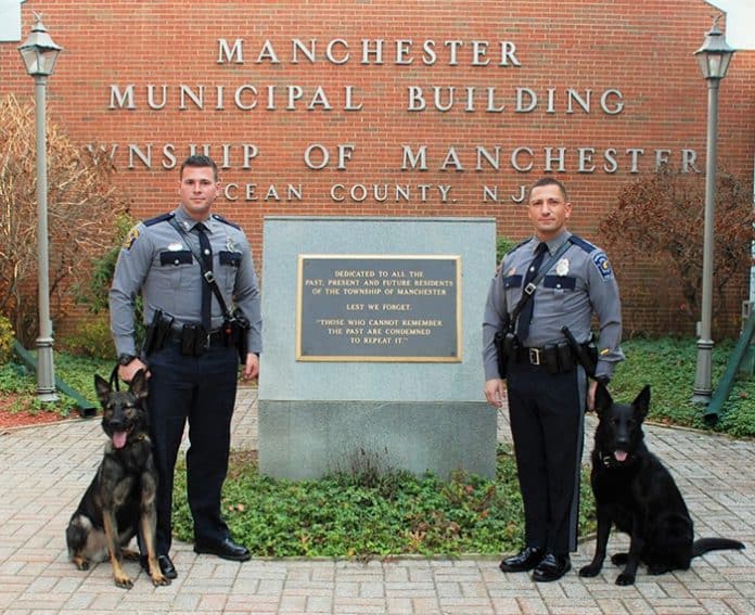 K-9 Officer Steven Wendruff and K-9 Lynk and K-9 Officer Marc Micciulla and K-9 Storm. (Photo courtesy Manchester Township Police Department)