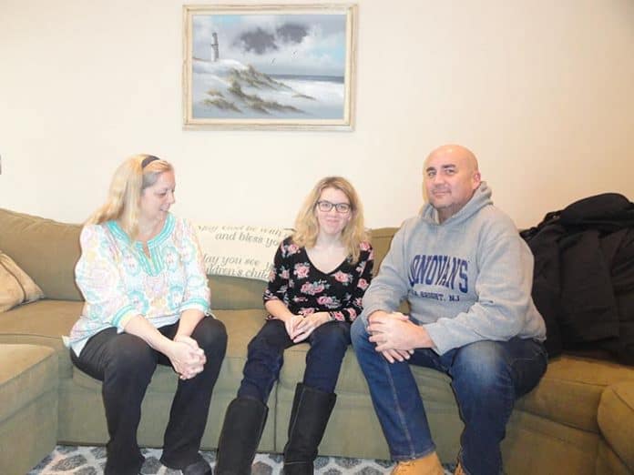 Megan Franzoso, center, with her mother, Deborah, and her uncle, Brian Geoghegan. (Photo by Patricia A. Miller)