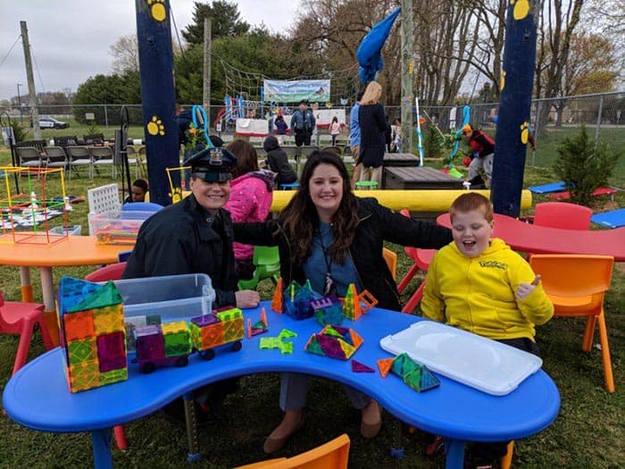 Howell Police Officer Maureen McBride, Memorial Elementary guidance counselor Samantha Murrillo and Memorial student Ed Czarnecki enjoy the STEAM Station of the Bulldog Retreat. (Photo courtesy Skye Donzelli)