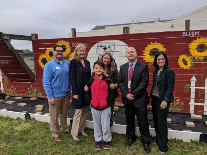 OceanFirst Bank representatives Joseph Tuzzio and Katherine Durante, Memorial teacher Skye Donzelli and Official Tour Guide and Peace Leader student Jhoan Arcila, and Principal Ray Gredder and Vice Principal Chrissy Anderson-Remo. (Photo courtesy Skye Donzelli)