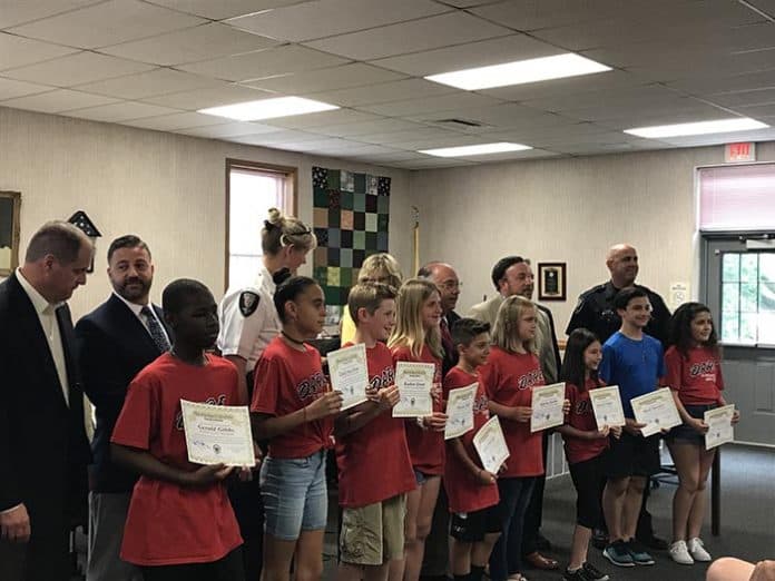 The Berkeley Township governing body honored the D.A.R.E. role models for the year. (Photo by Chris Lundy)