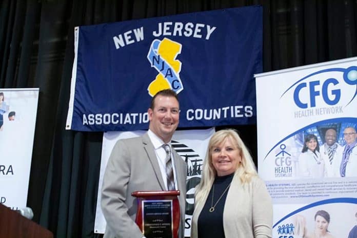 Monmouth County Public Health Coordinator Christopher P. Merkel was recently honored for his commitment to local government with county service award. (Photo courtesy Monmouth County)