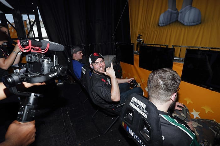 Nick Jobes waves to the camera during the first eNASCAR Heat Pro League race at Charlotte Motor Speedway. (Photo courtesy Hendrick Motorsports)