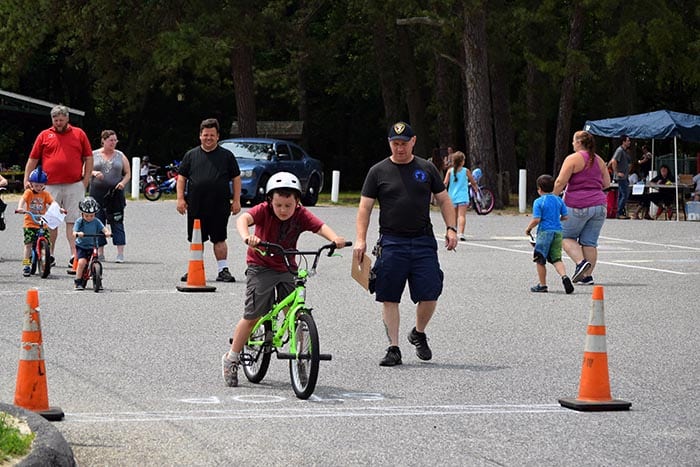 Participants wove their way through an agility course at the annual Bicycle Rodeo. (Photo courtesy Denise Maynard)