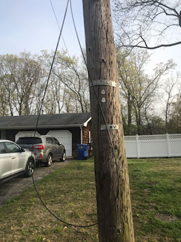 Low-Hanging Wires, Crooked Utility Poles Addressed