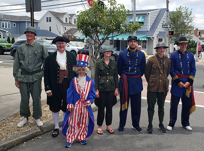 Normandy Beach Flag Raising Also Raises Patriotic Spirits