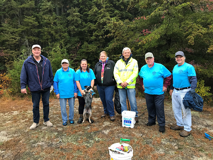 Volunteers Come Out In Rain To Clean Park