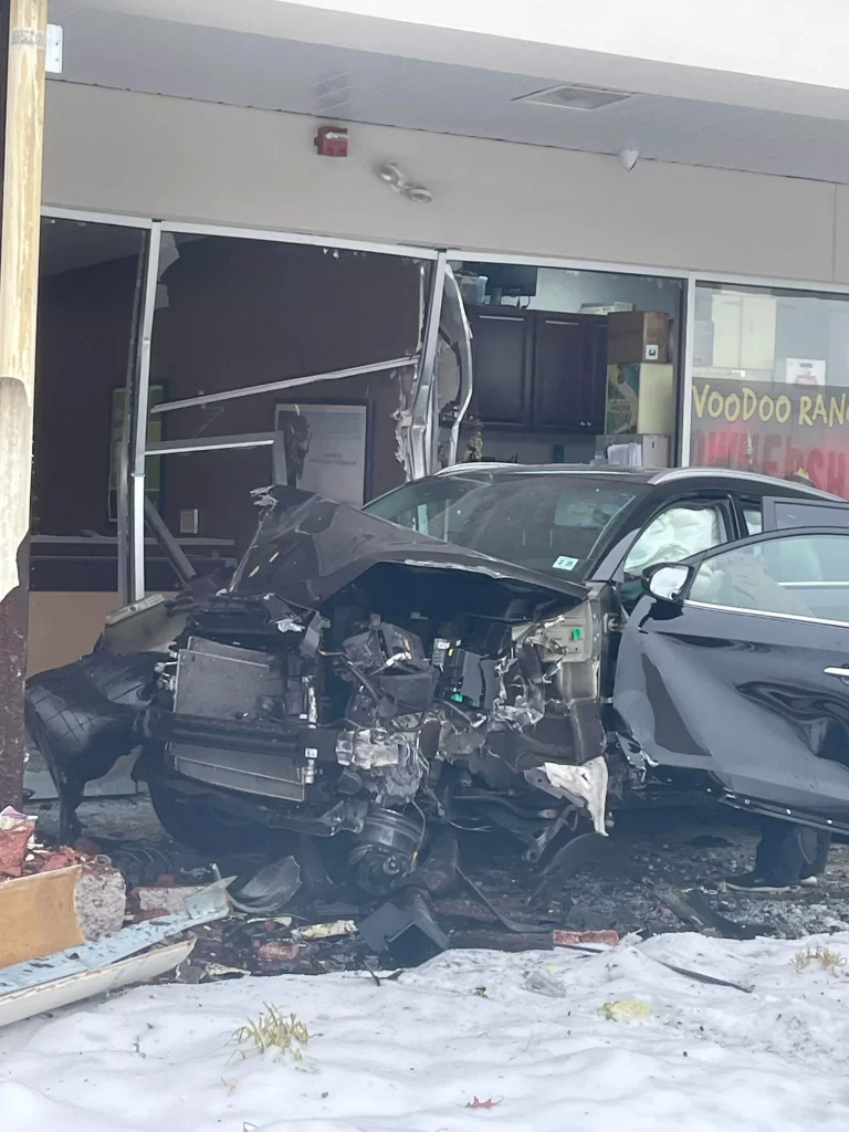 Woman Injured After Crashing SUV Into Two Businesses 