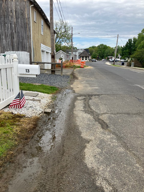 Resident Irked By Sludge In Street